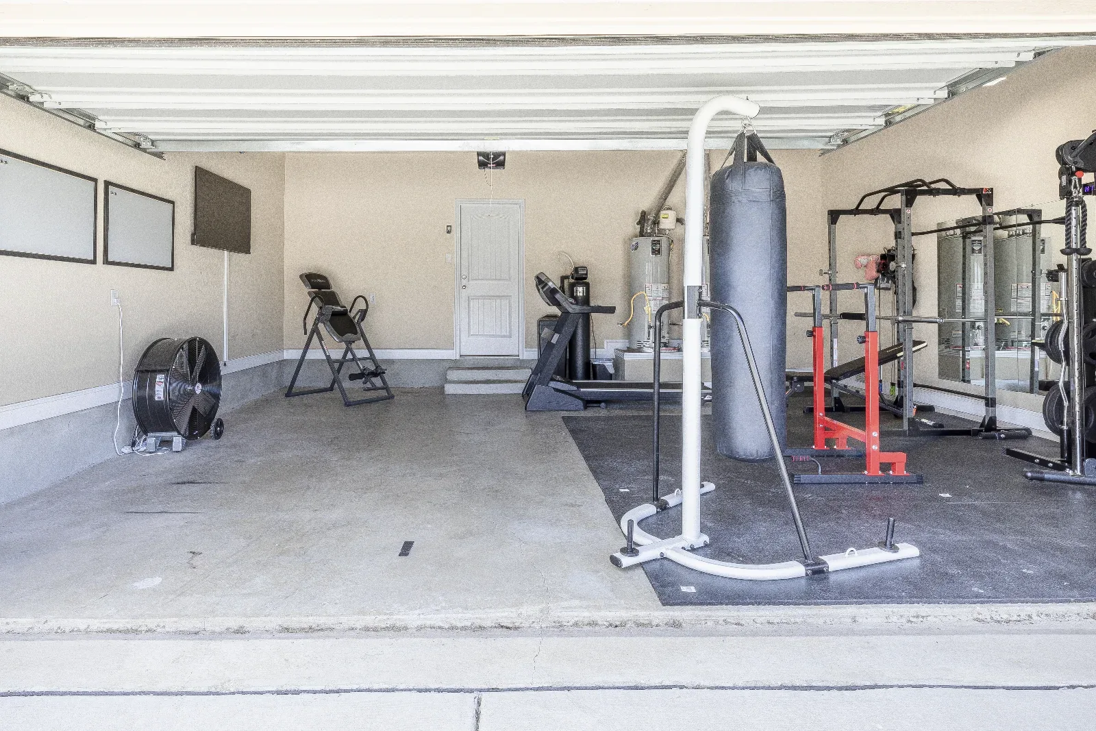 Full garage gym at Downwind Beach House- Randolph AFB Lodging