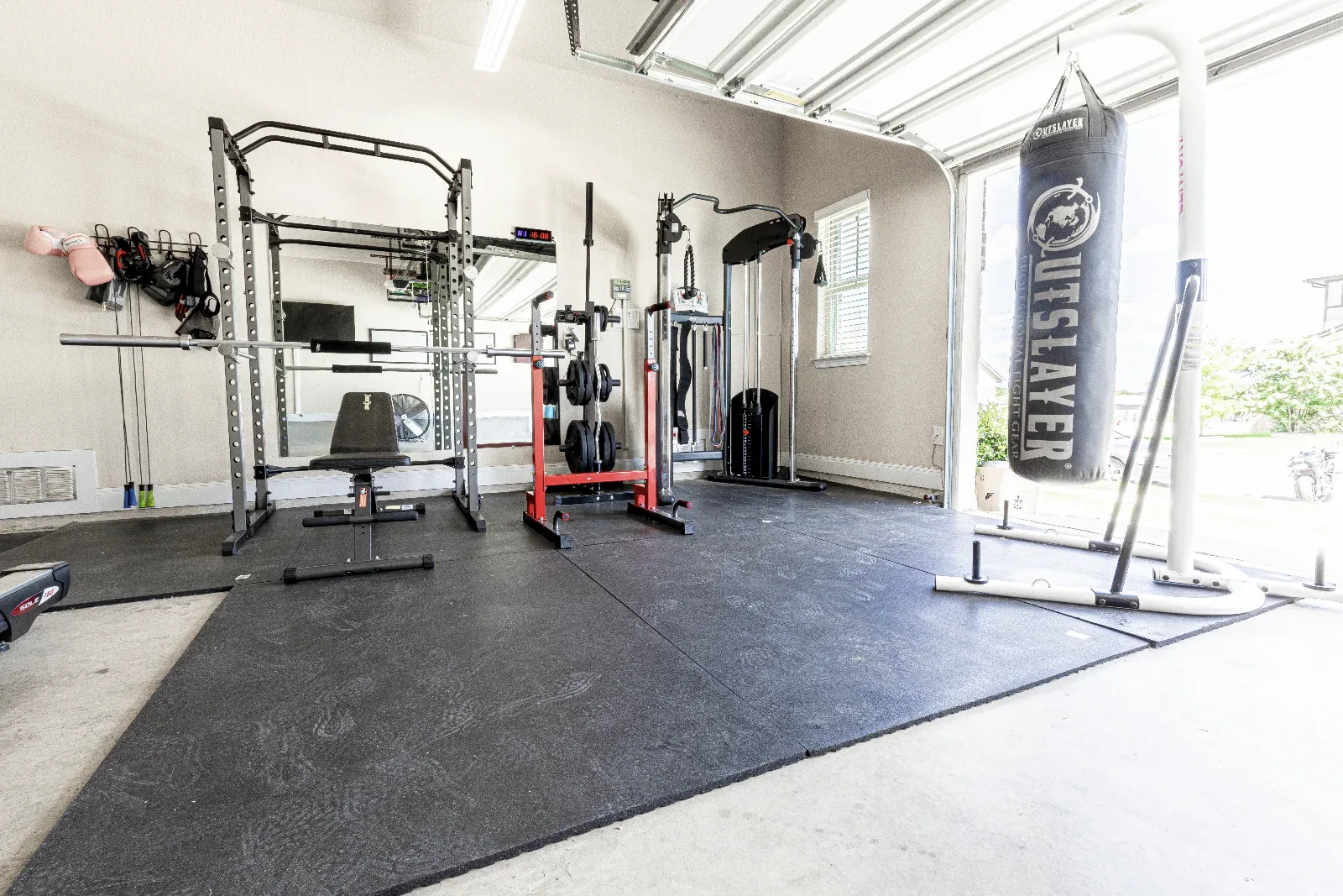 Garage gym at Downwind Beach House- Randolph AFB Lodging